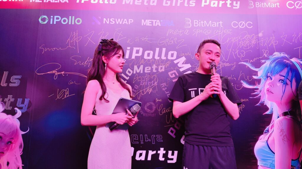 Justin Sun blushes as he shares a stage with Nina on Apr. 11, oblivious to the looming legal threat that will materialize the day after.
